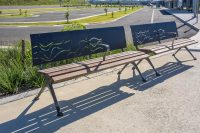 Mall DDA Seats (CMM7) with custom backrests in Monument, Jarrah battens and Woodland Grey frames.
