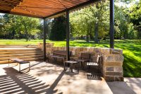 Linea Bench (LIB6) and Linea Seat (LIS10) with Spotted Gum hardwood battens, Textura Dark Bronze frame.