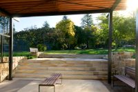 Linea Bench (LIB6) and Linea Seat (LIS10) with Spotted Gum hardwood battens, Textura Dark Bronze frame.