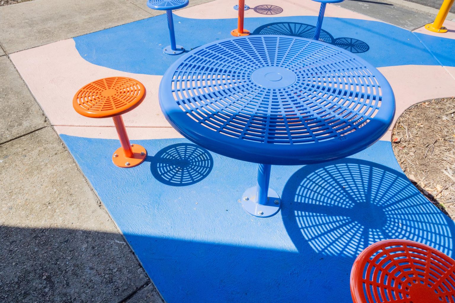 Cafe Round Table (T1) and Cafe Stools (S1) , surface fixed in Jaybird Blue and Sensation Orange