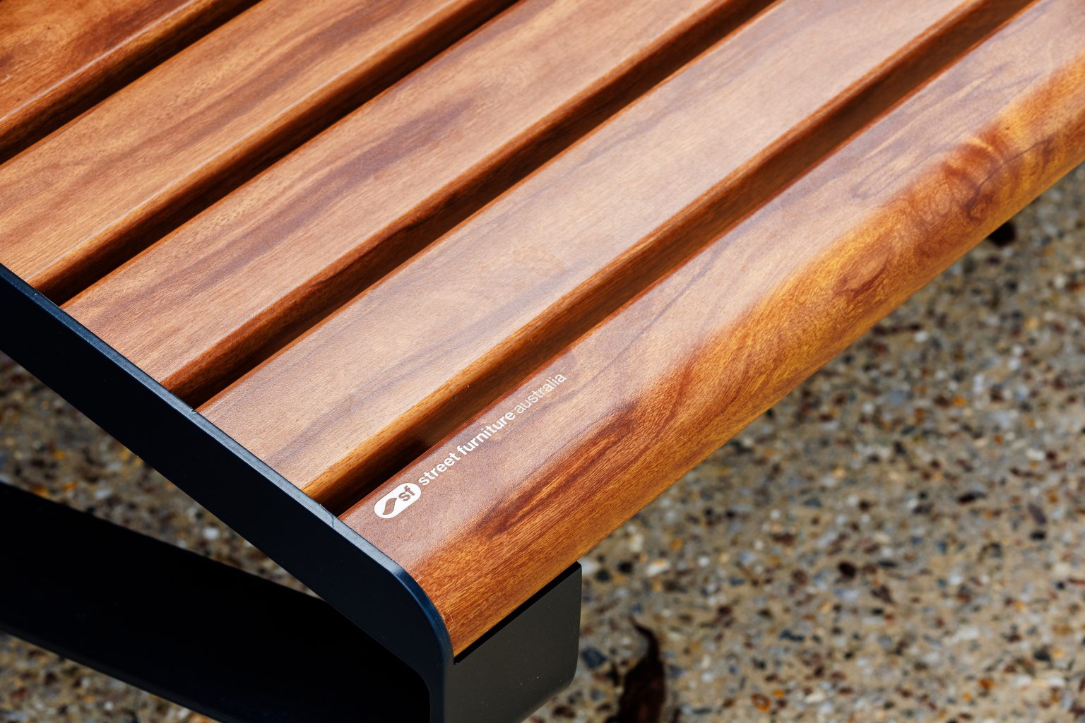 Linea wall mounted seats in aluminium spotted gum and charcoal frame
