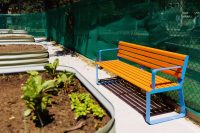 Linea Seat (LIS10 1800mm), freestanding with Bondi Blue frame and Sensation Orange battens
