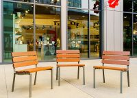 Forum Seats in aluminium woodgrain Bush Cherry, with Woodland Grey frames.
