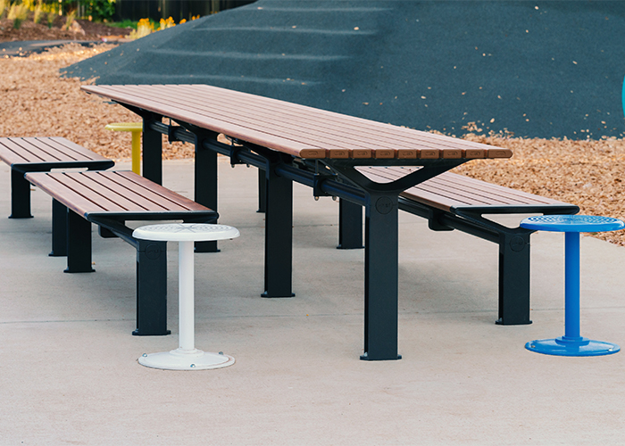 Aria Long Communal Table (CMA6-L) with aluminium Spotted Gum battens, Textura Monument frames.