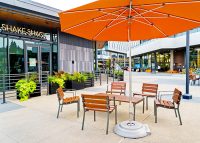 Forum Seats and Low Table in aluminium woodgrain Bush Cherry, with Woodland Grey frames.