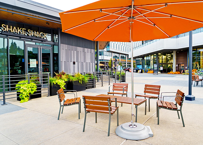 Forum Seats and Low Table in aluminium woodgrain Bush Cherry, with Woodland Grey frames.