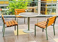 Forum Seats and Cafe Table in aluminium woodgrain Bush Cherry, and Woodland Grey.