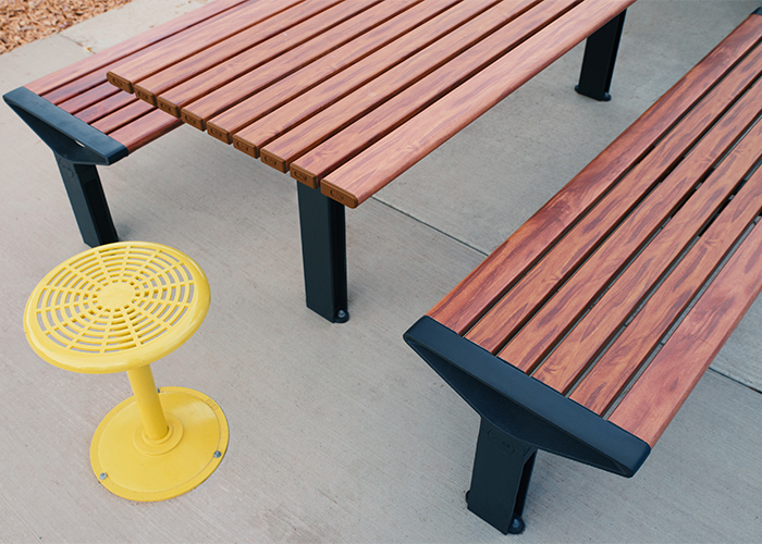 Aria Long Communal Table (CMA6-L) with aluminium Spotted Gum battens, Textura Monument frames.