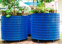 Frame Planter, tailored round 1000x800mm, in Bondi Blue with Slot perforation and adjustable feet.