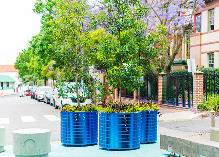 Frame Planter, tailored round 1000x800mm, in Bondi Blue with Slot perforation and adjustable feet.
