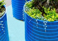 Frame Planter, tailored round 1000x800mm, in Bondi Blue with Slot perforation and adjustable feet.