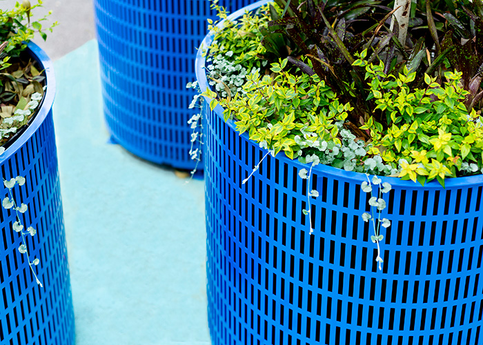 Frame Planter, tailored round 1000x800mm, in Bondi Blue with Slot perforation and adjustable feet.