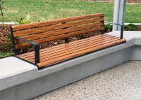 Linea Seat (LIS10) 1800mm with aluminium woodgrain Spotted Gum battens, Monument frame, plinth-fixed.