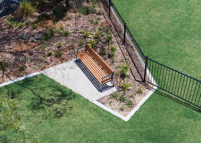 Linea Seat (LIS10) 1800mm with aluminium woodgrain Spotted Gum battens, Monument frame.