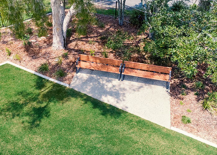 Linea Seat (LIS10) 1800mm with aluminium woodgrain Spotted Gum battens, Monument frame.