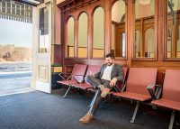 Termini's high armrests make it easy to sit and stand.