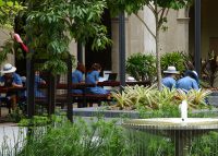 Classic Plaza Tables with Galleria Slim Benches: Jarrah battens, Night Sky frames. Photo: Wilson Architects.
