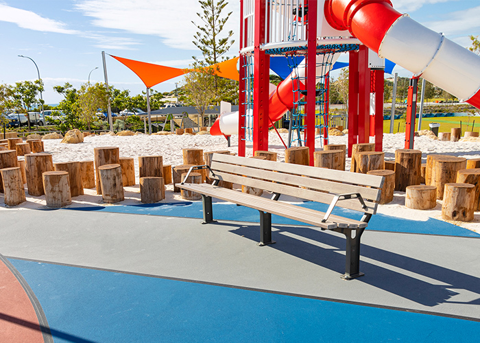 Park DDA Seat, aluminium woodgrain battens in Beach Oak, frames in Woodland Grey.