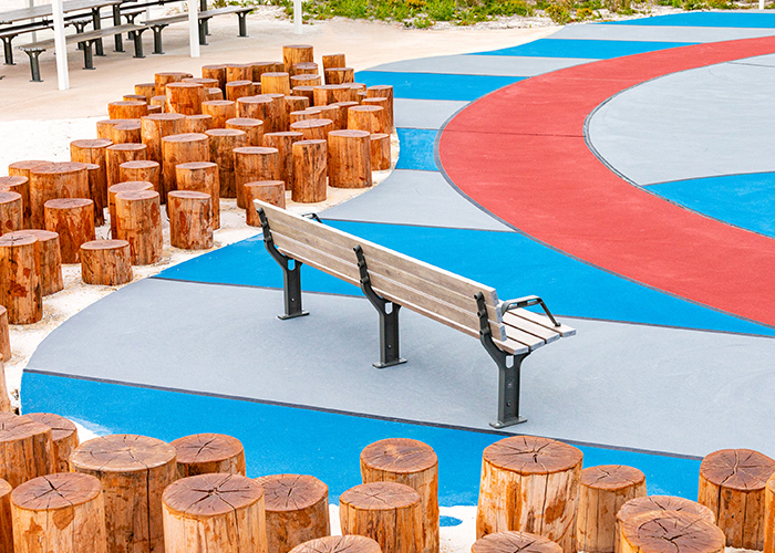 Park DDA Seat, aluminium woodgrain battens in Beach Oak, frames in Woodland Grey.