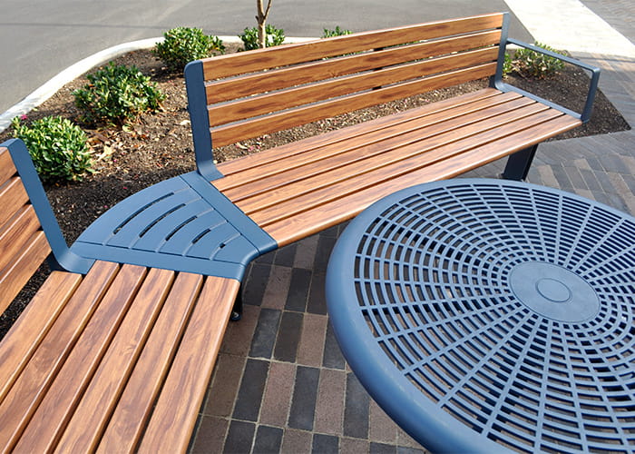 Aria Curved and Cafe Round Table, with aluminium woodgrain Spotted Gum battens and Deep Ocean frames.