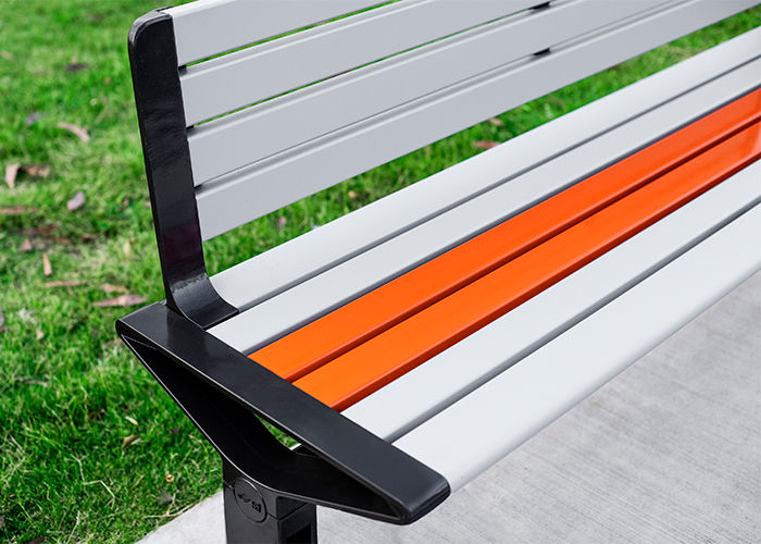 Aria Seat (CMA1, 1800mm) with Textura Silver and Sensation Orange battens, Charcoal frame.