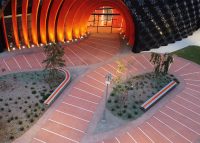 Mall Slim Bench, curved (CMM8-C) and straight (CMM8) plinth-fixed with Textura Silver and Sensation Orange battens, Charcoal frame.