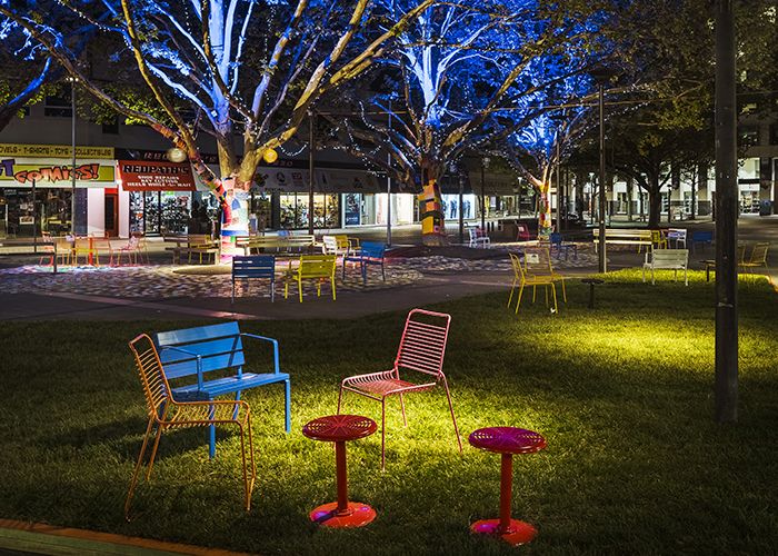 Forum Seat and Cafe Stools on the grass by Lawn Solutions. Photo: Jackie Chan, WE-EF LIGHTING.