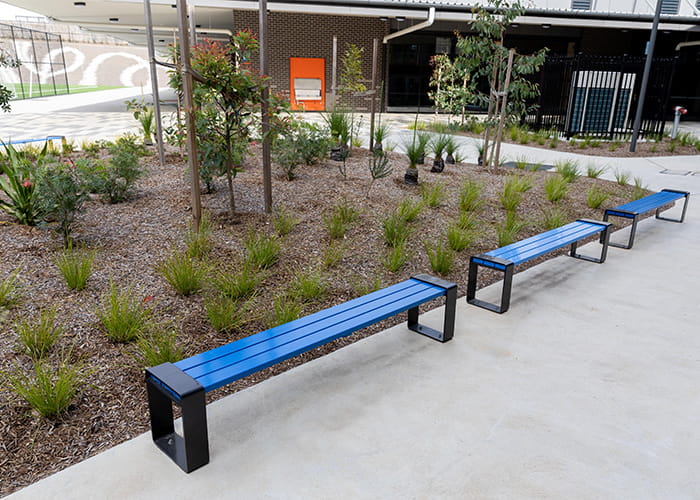 Tailored benches with powdercoated battens in Jaybird, frames in Charcoal.