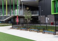 Tailored benches with powdercoated battens in Jaybird, frames in Charcoal.