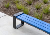 Tailored benches with powdercoated battens in Jaybird, frames in Charcoal.