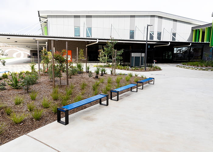 Tailored benches with powdercoated battens in Jaybird, frames in Charcoal.