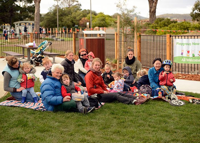Lush lawn for relaxed picnics at Bellerive All-Abilities playground.