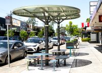 ChillOUT Tree (CT1) Bundle 3, powered, with flat circular roof in Textura Woodland Grey and Champagne perforated panels in Pale Eucalypt Green.