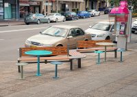 Aria Seating System (3S-C90-3B-C90-3S) with aluminium Spotted Gum battens and Textura Woodland Grey frame. Cafe Settings in tailored colour Deep Pool, Wizard and Pale Eucalypt Green.