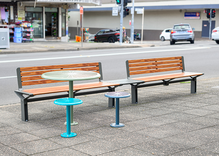 Aria Seating System (3S-C180-3S) with aluminium Spotted Gum battens and Textura Woodland Grey frame. Cafe Settings in Pale Eucalypt Green, Wizard and tailored colour Deep Pool.