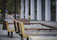 Custom seats and benches with brass detailing. Randal Photography.