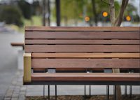 Custom seats with brass detailing. Randal Photography.
