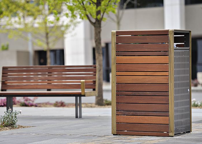 Custom seats and bin enclosures with brass detailing. Randal Photography.