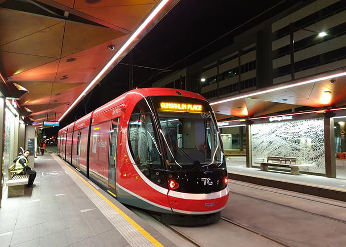 Canberra Metro station at night, with custom seats.