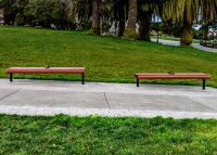 Classic Plaza Benches with legs tailored to level on a slope.