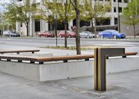 Custom drinking fountain and benches with brass detailing. Randal Photography.