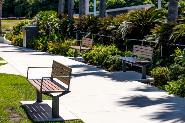 Aria Seat (CMA1) 3-seater with battens in aluminium woodgrain Spotted Gum, Textura Woodland Grey frame.