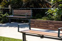 Aria Seat (CMA1) 3-seater with battens in aluminium woodgrain Spotted Gum, Textura Woodland Grey frame.