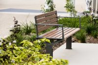 Aria Seat (CMA1) 3-seater with battens in aluminium woodgrain Spotted Gum, Textura Woodland Grey frame.