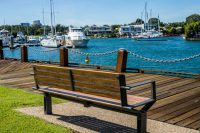 Aria Seat (CMA1) 3-seater with battens in aluminium woodgrain Spotted Gum, Textura Woodland Grey frame.