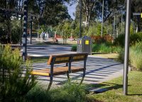 Custom seat designed by Tract, manufactured by Street Furniture Australia. Credit: J & E Photography