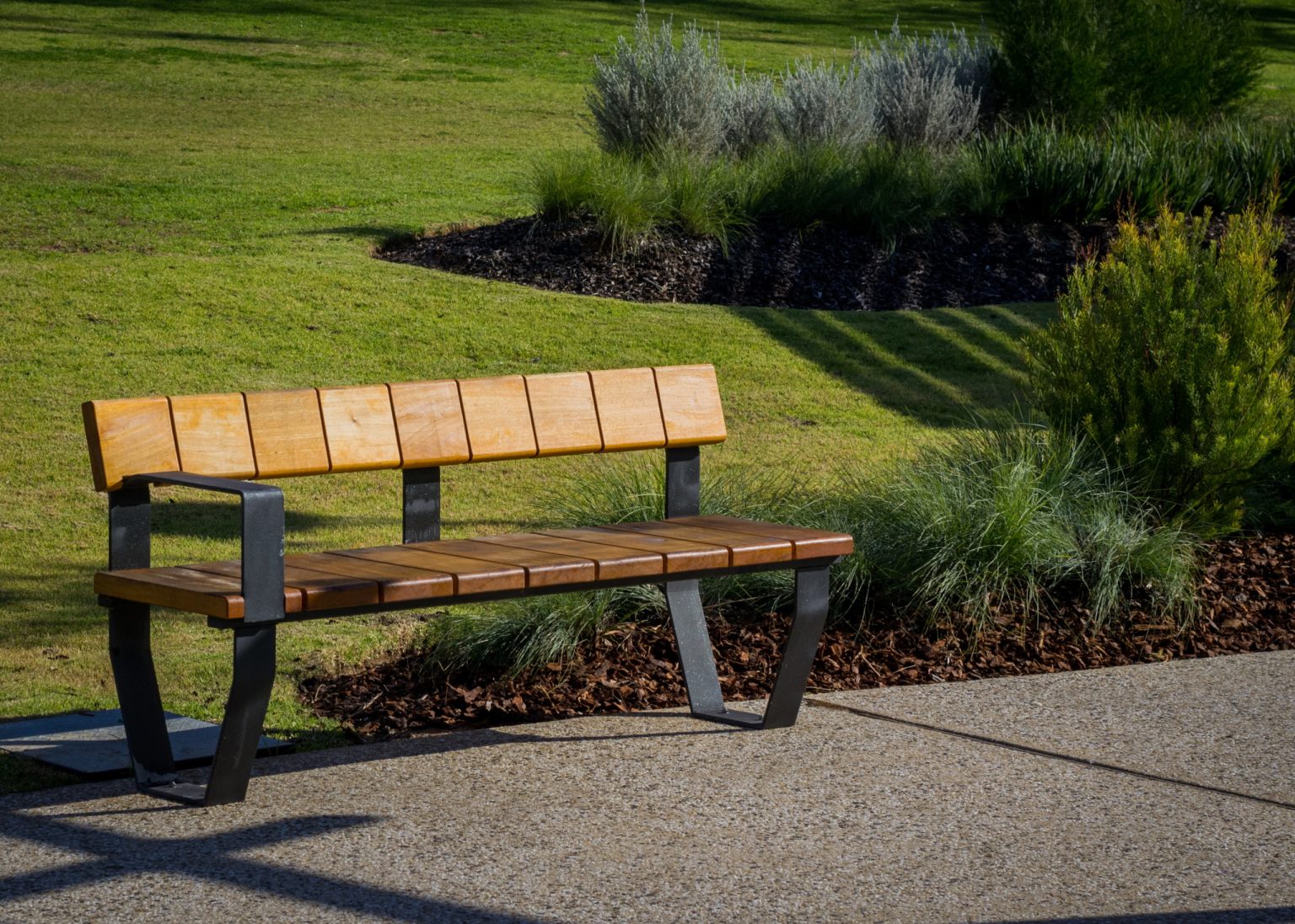 Custom seat designed by Tract, manufactured by Street Furniture Australia. Credit: J & E Photography