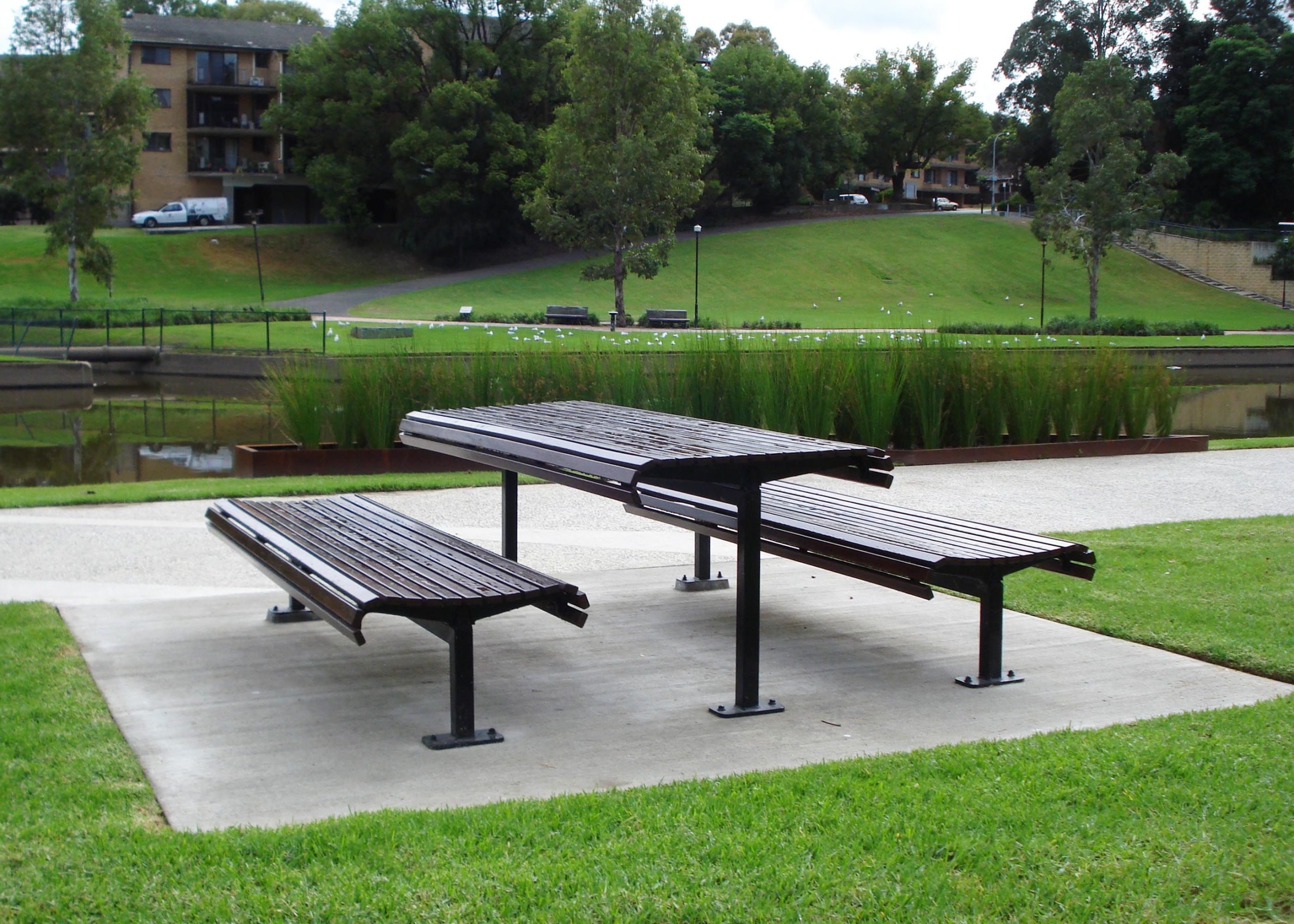 Classic Plaza Setting with eco-certified Jarrah hardwood battens and Night Sky frames.