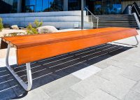 Custom bench, designed by SBLA, with hardwood battens and custom Shoji White frame.