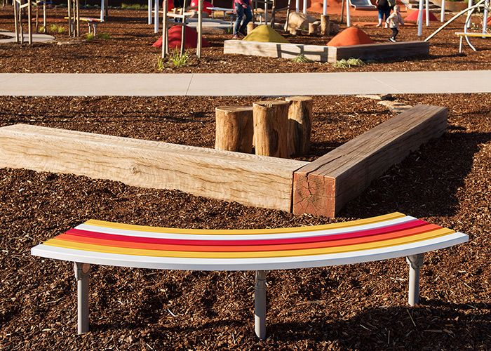 Mall Curved Slim Bench, battens in Pearl White, Safety Yellow, Sensation Orange and Lobster Red.